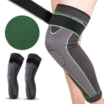 Gray ankle support brace with green accents on a white background