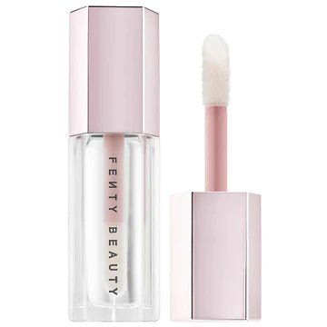 Model wearing the lip gloss, showcasing a radiant, full lip effect.