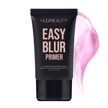 A clean product shot of Huda Beauty’s Easy Blur Primer in its 30ml bottle. The silicone-free smoothing primer is showcased with elegant branding, including the tagline 'Silicone-Free Smoothing Primer' and its French translation. The minimalist presentation highlights the luxurious packaging, emphasizing its lightweight, pore-blurring formula for a flawless makeup base