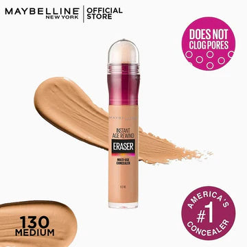 Close-up of Instant Eraser concealer with sponge tip and creamy formula showing