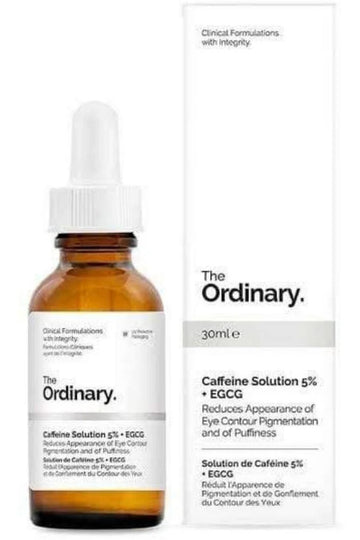 Close-up of the serum's clear liquid texture on skin