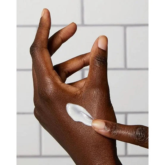 Hand applying CeraVe Itch Relief Lotion to dry, irritated skin, showing its lightweight, fast-absorbing texture.