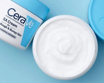 CeraVe SA Cream for Rough & Bumpy Skin in a white and blue jar, placed on a clean surface with label details visible.