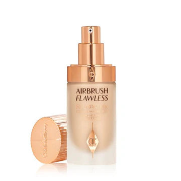 Close-up of smooth, poreless skin finish after applying Charlotte Tilbury foundation

