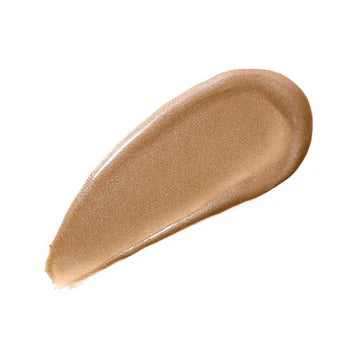 Hollywood Contour Wand with cushion applicator placed on vanity with makeup tools

