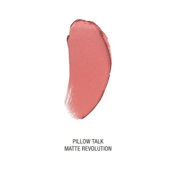 Close-up of Matte Revolution lipstick in Pillow Talk Original with the cap off, showing the nude-pink shade

