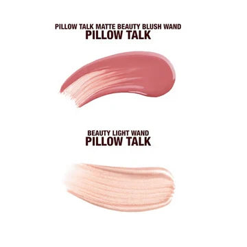 Close-up of Charlotte Tilbury blush and glow wand set in soft pink tones

