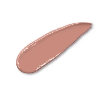 Charlotte Tilbury K.I.S.S.I.N.G. lipstick in elegant rose gold packaging on a vanity table

