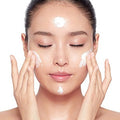Product styled with luxury skincare tools and soft lighting

