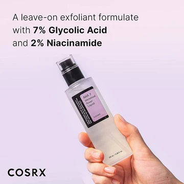 Front-facing product shot of COSRX AHA 7 Whitehead Power Liquid in its 100ml bottle, showcasing the label's key details: '7% Glycolic Acid' and '2% Niacinamide.' The minimalist packaging highlights this leave-on exfoliant formulated to target whiteheads and refine skin texture without irritation
