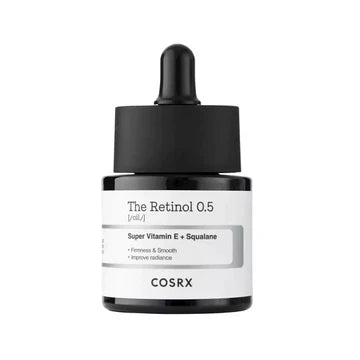 COSRX Retinol 0.5 Oil bottle with label highlighting active ingredients: 0.5% pure retinol (Vitamin A), Super Vitamin E complex, and squalane for advanced anti-aging and skin nourishment
