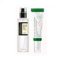 Front-facing product shot showing the complete packaging of COSRX Advanced Snail 96 Mucin Power Essence (100ml white bottle) and AXIS-Y Dark Spot Correcting Glow Serum (50ml dark glass bottle). The minimalist K-beauty packaging displays key labels - COSRX's snail icon and AXIS-Y's serum name in bold typography. Highlights the complementary skincare set for hyperpigmentation treatment (serum) and hydration/repair (essence), with visible size indicators and brand logos