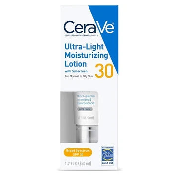 CeraVe Ultra-Light Moisturizing Lotion SPF 30 in a sleek white and blue tube placed on a marble surface.