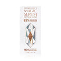 Charlotte Tilbury brightening and firming serum in gold-accented packaging on a vanity table

