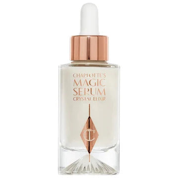 Flat-lay of skincare routine featuring the serum with other Charlotte Tilbury skincare products


