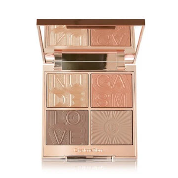 Close-up swatches of the face palette on medium skin showing glow and contour payoff

