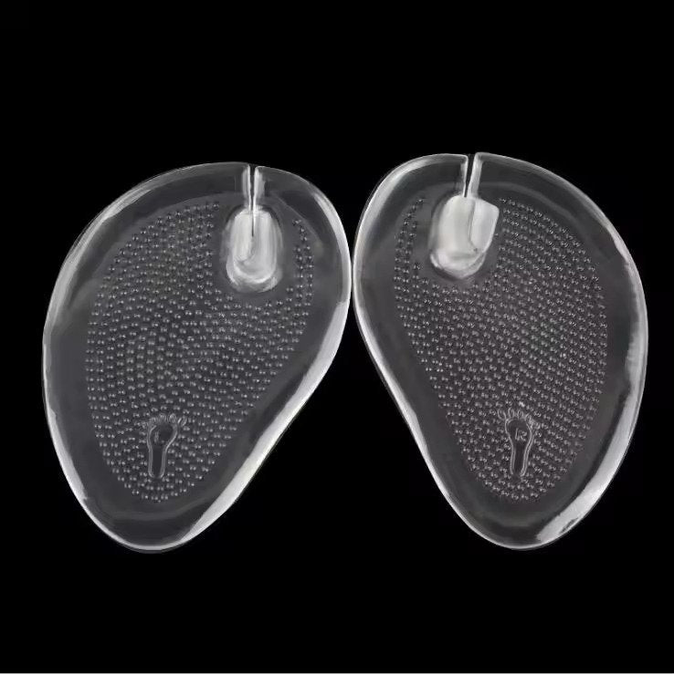 Black flip-flops with clear sandal inserts on a white background