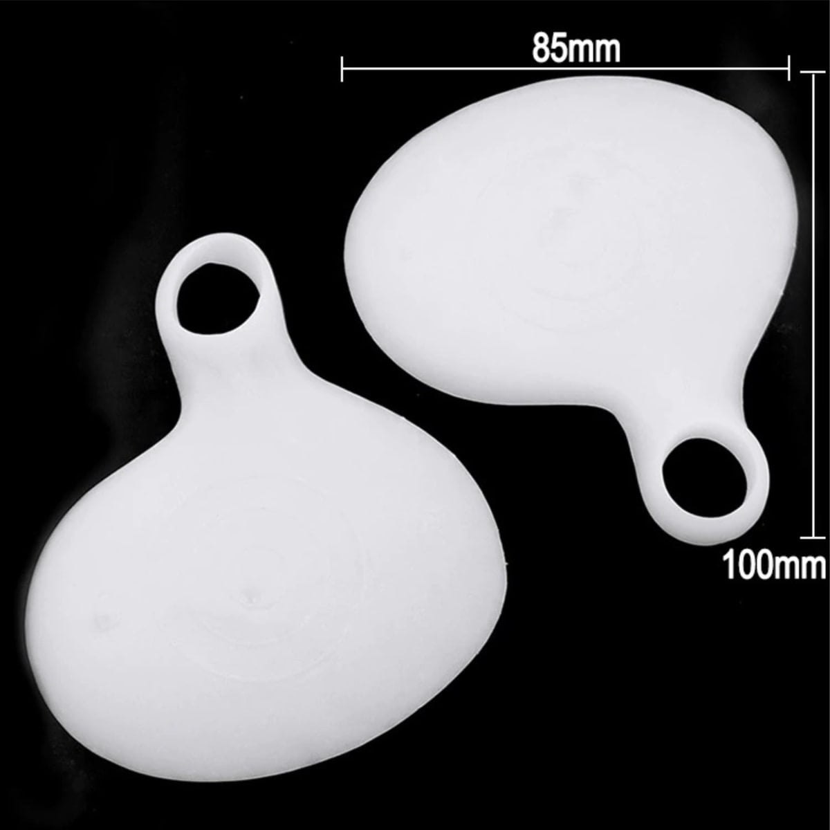 Two white漂浮物 with dimensions labeled on a black background