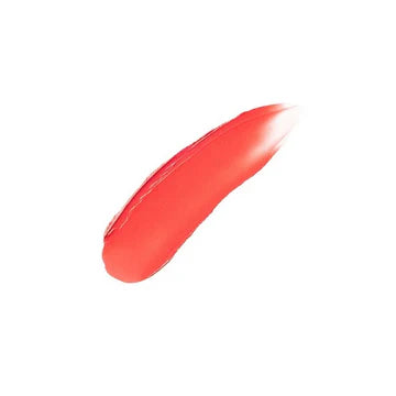 A close-up of the cream blush in a compact, showcasing its smooth, blendable texture.

