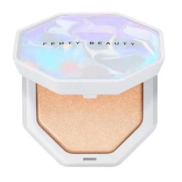Compact highlighter with a smooth, radiant finish displayed on a clean surface.

