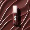  Lip gloss bottle with sheer tinted formula and high-shine finish