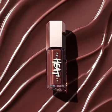  Lip gloss bottle with sheer tinted formula and high-shine finish