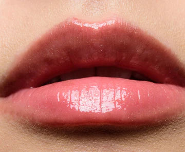 "Smooth, Cushion-Like Texture of Fenty Glow Gloss for Comfortable Wear"

