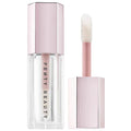 Model wearing the lip gloss, showcasing a radiant, full lip effect.


