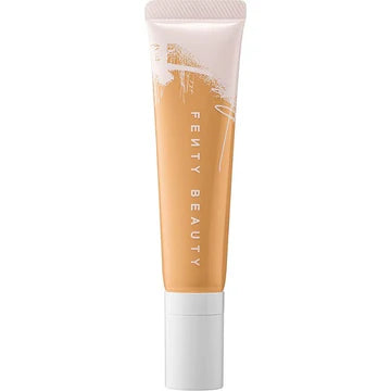  Application of foundation on face showing smooth, natural finish