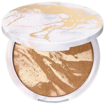 Swatch of bronze shimmer powder, showcasing its smooth, radiant finish.

