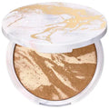 Swatch of bronze shimmer powder, showcasing its smooth, radiant finish.

