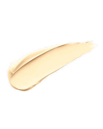 Swatches of 50 concealer shades on different skin tones.