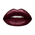 Arm swatch showing HUDA BEAUTY Demi Matte Lipstick's creamy matte finish