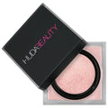Cherry Blossom shade of HUDA BEAUTY Easy Bake Powder with key features: makeup locking, shine absorption, and no flashback