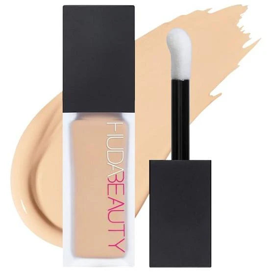 Huda Beauty #FauxFilter Luminous Matte Liquid Concealer with doe-foot applicator and product swatch