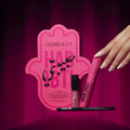 Close-up of Huda Beauty's Habibti Eye & Lip Set showcasing the Creamy Kohl eyeliner, with the brand's luxurious packaging in metallic tones and clean typography highlighting the product name