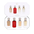Four KAYALI 10ml mini perfumes in gold-capped bottles (Vanilla 28, Juicy Apple 01, White Flower 57, Amber 23) displayed with minimalist brandingFour KAYALI 10ml mini perfumes in gold-capped bottles (Vanilla 28, Juicy Apple 01, White Flower 57, Amber 23) displayed with minimalist branding