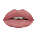 Close-up of HUDA BEAUTY Liquid Matte Lipstick being applied to lips