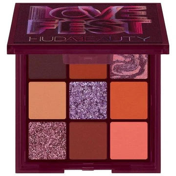 Huda Beauty Wild Obsessions Jaguar mini eyeshadow palette - compact leopard-print case with 9 pans visible