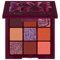 Huda Beauty Wild Obsessions Jaguar mini eyeshadow palette - compact leopard-print case with 9 pans visible
