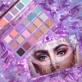 HUDA BEAUTY Mercury Retrograde Eyeshadow Palette showcasing 18 shades including 9 mattes, 6 metallics, 1 glitter, and 2 multi-reflective toppers for celestial makeup looks