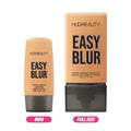 Size comparison showing Huda Beauty Easy Blur Foundation in both mini (10ml) and full-size versions, with Creme Brulee shade displayed