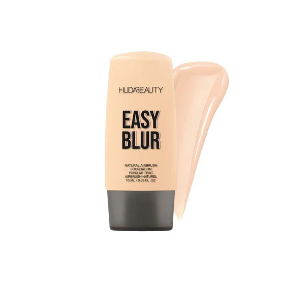 Close-up of HUDA BEAUTY Mini Easy Blur Foundation packaging with 'Easy Blur' branding