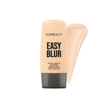 Close-up of HUDA BEAUTY Mini Easy Blur Foundation packaging with 'Easy Blur' branding