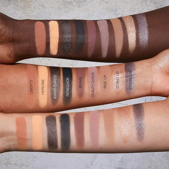 Open Huda Beauty Pretty Grunge palette displaying 9 eyeshadow shades
