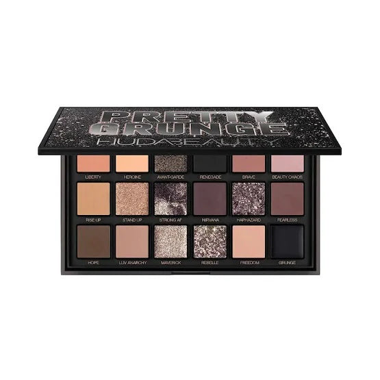 Open Huda Beauty Pretty Grunge palette displaying 9 eyeshadow shades
