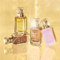 All four KAYALI vanilla mini perfumes lined up together