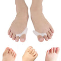 Bunion correctors on feet with a white background