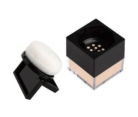 Huda Beauty Easy Bake Loose Powder in a jar, a silky translucent powder for matte, luminous makeup setting and baking