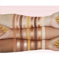 Warm-toned eyeshadow palette with matte and shimmer finishes in toffee and brown shades
